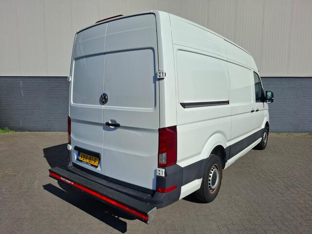 Volkswagen CRAFTER 35 2.0 TDI L3H3 Highline 3p. Navi Airco CruiseControl Verw.Voorruit Regensensor Pdc V+A SchuifdeurRechts Aut.Verlichting Start/Stop Elek.Ramen/Spiegels VerwamerbareSpiegels Verst.Stoel