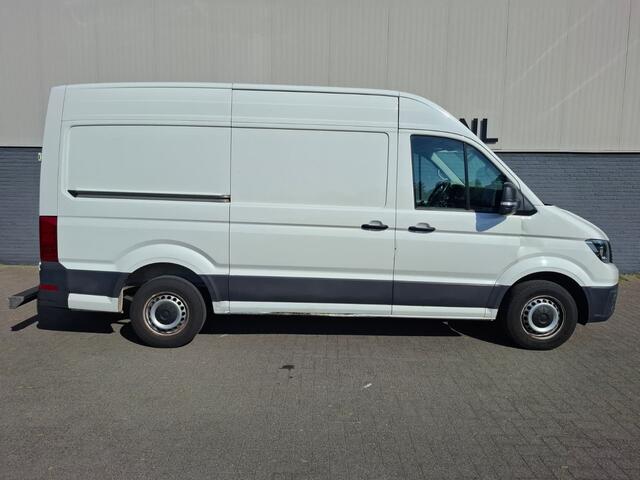 Volkswagen CRAFTER 35 2.0 TDI L3H3 Highline 3p. Navi Airco CruiseControl Verw.Voorruit Regensensor Pdc V+A SchuifdeurRechts Aut.Verlichting Start/Stop Elek.Ramen/Spiegels VerwamerbareSpiegels Verst.Stoel