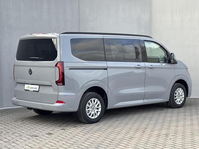 Volkswagen E-Transporter Caravelle 32 L1H1 Life 64 kWh Automaat / NIEUW/ Fabrieksgarantie tot 12-2027 / 8 Persoons / Stone Gray / Warmtepomp / Apple Carplay/Android Auto / Licht en zicht-pakket / Keyless entry / draadloze telefoonlader /