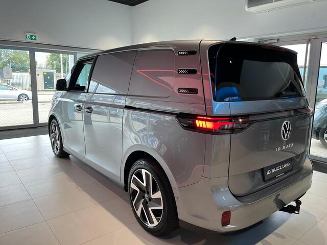 Volkswagen ID. Buzz Cargo Bedrijfswagens Bulli edition Elektromotor 250 kW (340 pk) 250 kW | Achterlichten led, luxe uitgevoerd incl. dynamische knipperlichten | Open & close pakket plus | Schuifdeuren links en rechts elektrisch | Verwarmbaar multifunctioneel stuurwiel met leder b