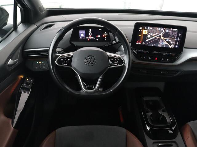 Volkswagen ID.4 Life 77 kWh | Trekhaak | Stoel & stuurverwarming | Camera | Adaptive cruise | Carplay | Navigatie | Parkeerhulp | Half leder