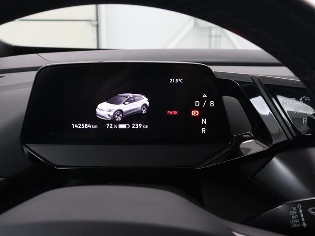 Volkswagen ID.4 Life 77 kWh | Trekhaak | Stoel & stuurverwarming | Camera | Adaptive cruise | Carplay | Navigatie | Parkeerhulp | Half leder