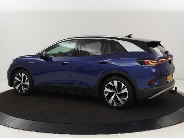 Volkswagen ID.4 First 77 kWh | Trekhaak | Automaat | Sfeerverlichting | Camera | Navigatie | Stoelverwarming | Carplay | LMV 20 inch | LED | Cruise Control | Getint glas | Climate controle