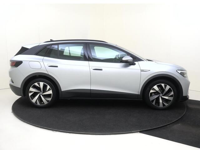 Volkswagen ID.4 Life 77 kWh | Navigatie | Adaptieve cruise control | Stoelverwarming | Parkeersensoren | CarPlay | Elektrisch inklapbare buitenspiegels | Voorklimatisering |