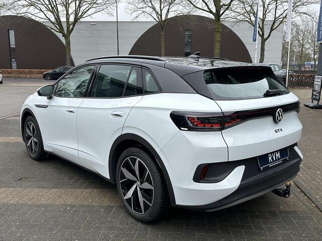 Volkswagen ID.4 GTX Advantage 4Motion 77 kWh 300PK | SOH 90% | WARMTEPOMP | 20 INCH | TREKHAK ELEKTRISCH UITKLAPBAAR | ACC CRUISE CONTROLE | STOEL + STUURWIELVERWARMING | MATRIX-LED-KOPLAMP (IQ.LIGHT) | RIJKLAAR GELEVERD MET 12 MND BOVAG GARANTIE