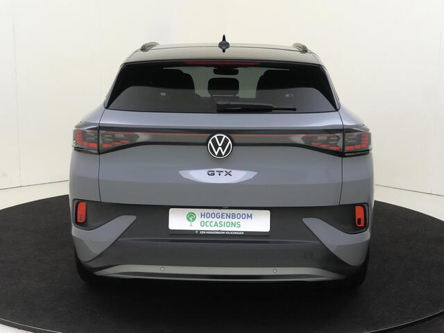 Volkswagen ID.4 GTX 4Motion 77 kWh | SoH 92% | Panoramadak | 360 camera | Dodehoek detectie | Keyless | Adaptieve cruise control | CarPlay | Parkeerassistent | Stoel- en stuurwielverwarming |