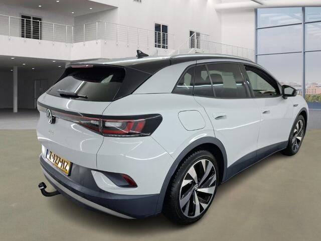 Volkswagen ID.4 First 77 kWh | Stoelverwarming | Stuurverwarming | Trekhaak | Adaptive Cruise Control | Navigatie | Apple Carplay | Keyless | Camera | Parkersensoren |