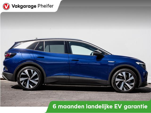 Volkswagen ID.4 First Pro 77 kWh SOH 89% Trekhaak/ Stoel-stuurverwarming/ Camera/ Navigatie/ Carplay/ Sfeerverlichting/ Full led/ 20" Lmv