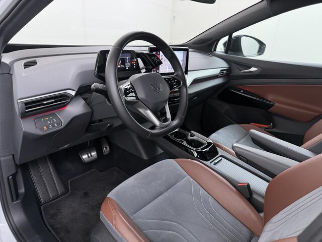 Volkswagen ID.4 First 82kWh Trekhaak Warmtepomp SOH 90% Adap.Cruise Stoelverwarming Apple Carplay Android Auto Navi Ecc Camera Lmv 20" Voorruitverwarming Privacy Glas Led DAB 1.000KG Trekgewicht Origineel Nederlandse Auto