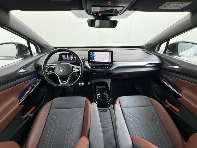 Volkswagen ID.4 First 82kWh SOH 90% Warmtepomp Trekhaak Camera Adap.Cruise Apple Carplay Android Auto Stuur+Stoelverwarming Navi Ecc Pdc Lmv 20" Led Wifi Voorruitverwarming DAB Isofix Verkeersbord detectie 1.000KG Trekgewicht 1e Eigenaar Dealeronderhouden