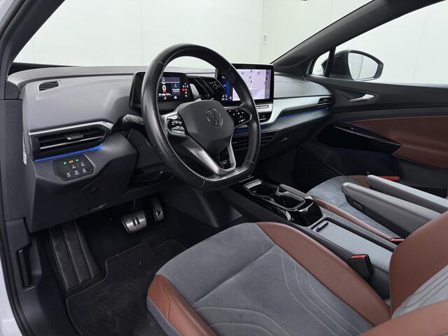 Volkswagen ID.4 First 82kWh SOH 90% Warmtepomp Trekhaak Camera Adap.Cruise Apple Carplay Android Auto Stuur+Stoelverwarming Navi Ecc Pdc Lmv 20" Led Wifi Voorruitverwarming DAB Isofix Verkeersbord detectie 1.000KG Trekgewicht 1e Eigenaar Dealeronderhouden