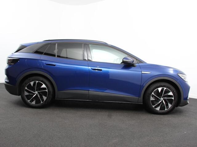 Volkswagen ID.4 Business 77 kWh Leder Navigatie 19" Lichtmetalen Velgen Apple Carplay/Android Auto Climate Control Warmtepomp Stoelverwarming Led Parkeer sensoren