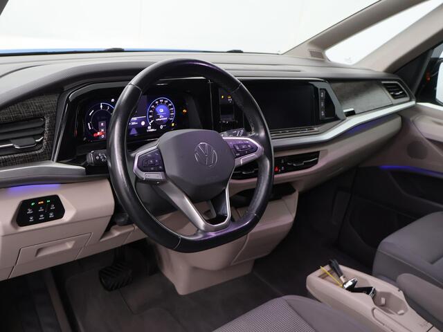 Volkswagen MULTIVAN 1.4 eHybrid L1H1 Style | 218 PK | Automaat | 6-Zitter Vis-a-Vis | Navigatie | Panoramadak | Stoelverwarming |