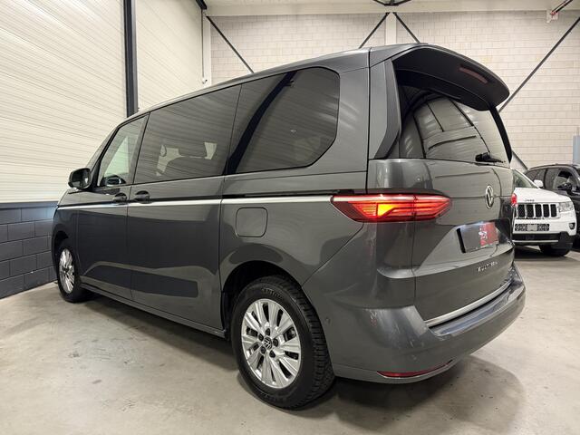 Volkswagen MULTIVAN 1.4 eHybrid Style 7p. LEER-ALCANTARA/TREKHAAK/IQ-LIGHT/EL.SCUIFDEUREN/SFEER/NAVI/CARPLAY/ADAPTIVE CRUISE/CHROOMSTRIP EXTERIEUR/PRIVACY/INDIUMGRAU-METALLIC/BOUWJAAR 04-2023/BTW-AUTO, PRIJS IS INCL. BTW
