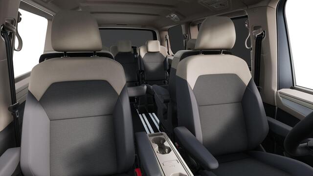 Volkswagen MULTIVAN Bulli L2 1.5 Ehybrid 180kW 245 pk DSG 4 motion | Versterkte kunststof vloerbedekking in houtlook | Multifunctionele verschuifbare tafel in passagiersruimte | Navigatiesysteem '' Discover Pro'' | Privacy Plus glas (90%) vanaf B-stijl |