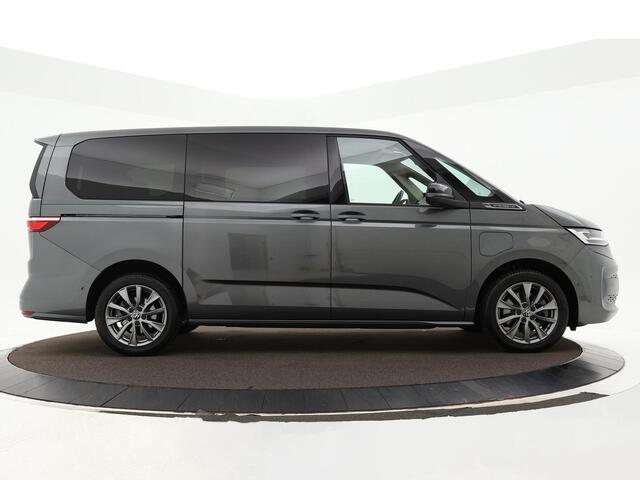 Volkswagen MULTIVAN 1.4 218pk DSG eHybrid L2H1 Life Business 7p. · Panoramadak · Apple/Android Car Play · IQ.Light · Navigatie · Camera · 7 Persoons · Elek. Achterklep · 18'' Inch · Garantie t/m 23-06-2027 of 150.000km