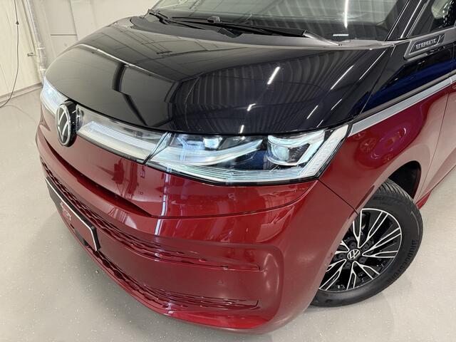 Volkswagen MULTIVAN 1.4 eHybrid Energetic 7p. PANO/LEER/IQ-LIGHT/TREKHAAK/HARMAN-KARDON/CARPLAY/ADAPTIVE-ONDERSTEL/SFEER/ACC/EL.SCHUIFDEUREN/STANDKACHEL/CAMERA/TWO-TONE FORTANA-RED METALLIC-DEEP BLACK PEARL/VOLLEDIG VW DEALER HISTORIE, N