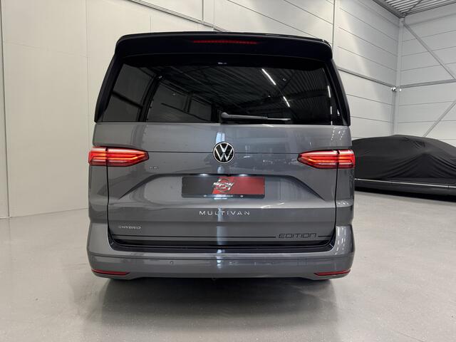 Volkswagen MULTIVAN 1.4 eHybrid EDITION 7p. IQ-LIGHT/TREKHAAK/H&K/LEER-ALCANTARA/CAMERA/ACC/SFEER/ELECTR.SCHUIFDEUREN/18"BLACK/EL.A.KLEP/BLACK-OPTIC/INDIUMGRAU-ZWART DAK/VOLLEDIG VW DEALER HISTORIE