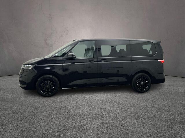 Volkswagen MULTIVAN 1.4 TSI 218pk DSG eHybrid PHEV L2 Life | Lederen bekleding | 7-zits vis-a-vis incl. tafel | Elek. schuifdeuren en achterklep | Trekhaak | ACC | Navigatie |Camera | Keyless | Alarm