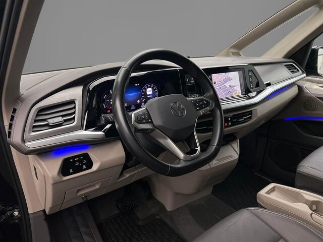 Volkswagen MULTIVAN 1.4 TSI 218pk DSG eHybrid PHEV L2 Life | Lederen bekleding | 7-zits vis-a-vis incl. tafel | Elek. schuifdeuren en achterklep | Trekhaak | ACC | Navigatie |Camera | Keyless | Alarm