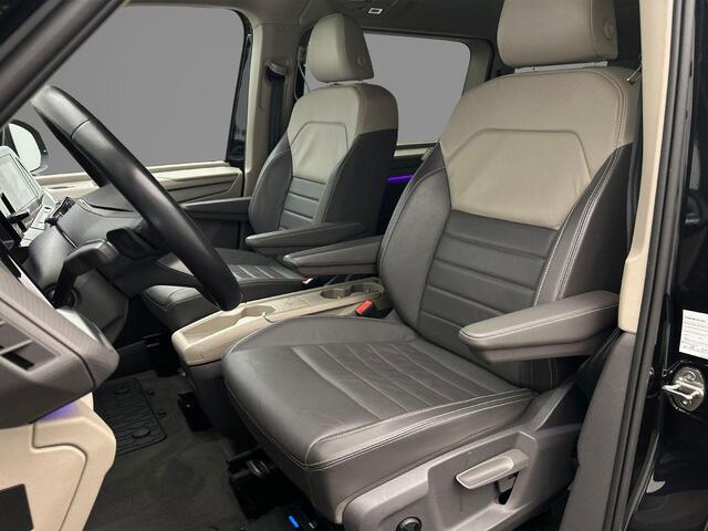 Volkswagen MULTIVAN 1.4 TSI 218pk DSG eHybrid PHEV L2 Life | Lederen bekleding | 7-zits vis-a-vis incl. tafel | Elek. schuifdeuren en achterklep | Trekhaak | ACC | Navigatie |Camera | Keyless | Alarm
