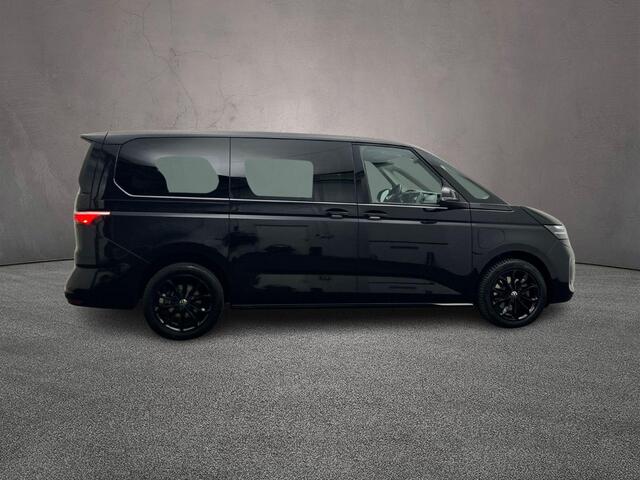 Volkswagen MULTIVAN 1.4 TSI 218pk DSG eHybrid PHEV L2 Life | Lederen bekleding | 7-zits vis-a-vis incl. tafel | Elek. schuifdeuren en achterklep | Trekhaak | ACC | Navigatie |Camera | Keyless | Alarm