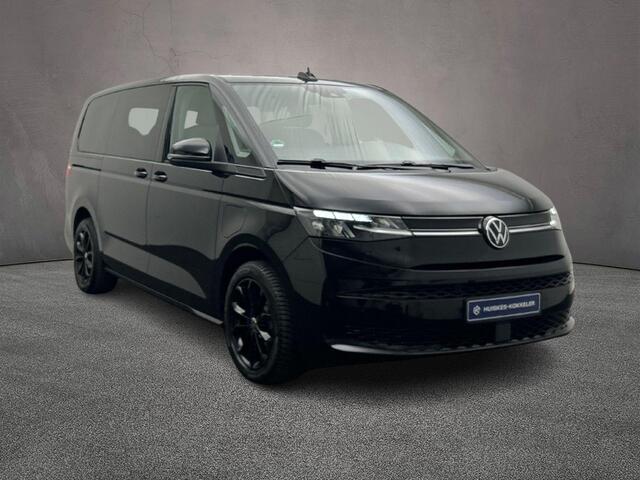 Volkswagen MULTIVAN 1.4 TSI 218pk DSG eHybrid PHEV L2 Life | Lederen bekleding | 7-zits vis-a-vis incl. tafel | Elek. schuifdeuren en achterklep | Trekhaak | ACC | Navigatie |Camera | Keyless | Alarm