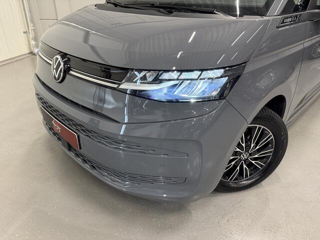 Volkswagen MULTIVAN 1.4 eHybrid L2 BULLI EDITION 7p. PURE-GREY/TREKHAAK/CAMERA/ACC/STANDKACHEL/CARPLAY/NAVI/ELECTR.A.KLEP/PRIVACY/17"/SCHUIFRUITJES/VOLLEDIG VW DEALER HISTORIE