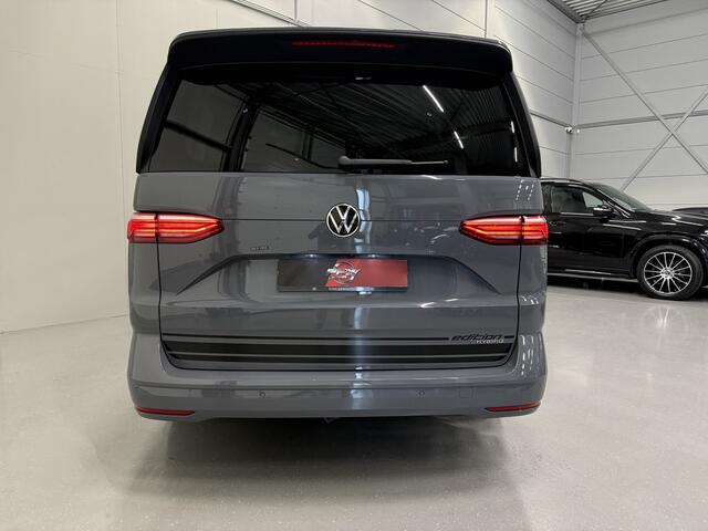Volkswagen MULTIVAN 1.4 eHybrid L2 BULLI EDITION 7p. PURE-GREY/TREKHAAK/CAMERA/ACC/STANDKACHEL/CARPLAY/NAVI/ELECTR.A.KLEP/PRIVACY/17"/SCHUIFRUITJES/VOLLEDIG VW DEALER HISTORIE