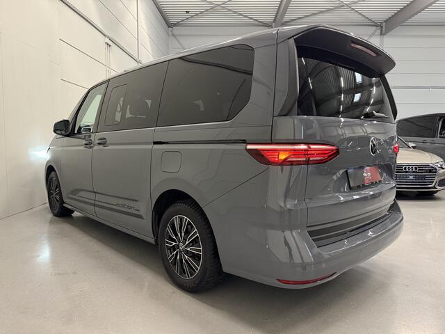 Volkswagen MULTIVAN 1.4 eHybrid L2 BULLI EDITION 7p. PURE-GREY/TREKHAAK/CAMERA/ACC/STANDKACHEL/CARPLAY/NAVI/ELECTR.A.KLEP/PRIVACY/17"/SCHUIFRUITJES/VOLLEDIG VW DEALER HISTORIE