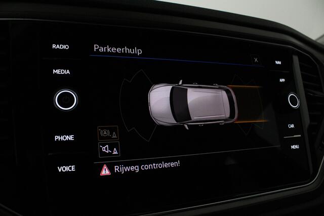Volkswagen T-Roc 1.0 TSI Style > 110pk/Kleur Indium Grey/Parkeersensoren/navi/All season banden