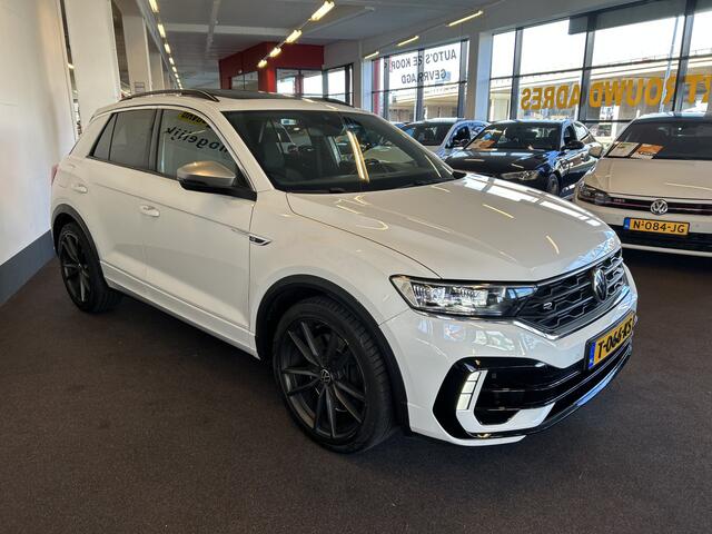Volkswagen T-Roc 2.0 TSI 4Motion R 300PK | Panoramadak | Digital dashboard | Beats audio | Adaptieve cruise control | Adaptief onderstel | Lane assist | Dodehoeksdetectie | Achteruitrijcamera | Stoelverwarming | Kleppensysteem | Elek. inklapbare spiegels