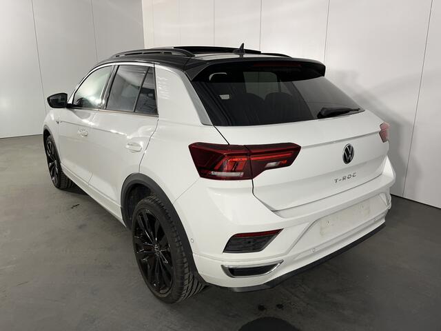 Volkswagen T-Roc 1.5 TSI R-Line / AUTOMAAT/ PANO/ STUUR+STOELVERWARM./ PARK.SENSOR.V+A/ CAMERA/ DODE HOEK/ APP-CONNECT/ ELEK.KLEP/ KEYLESS/ ACC/ RIJ-MODI/ DIGITAL DASH/ NAVI/ DAB/ CLIMA/ LED/ ISOFIX