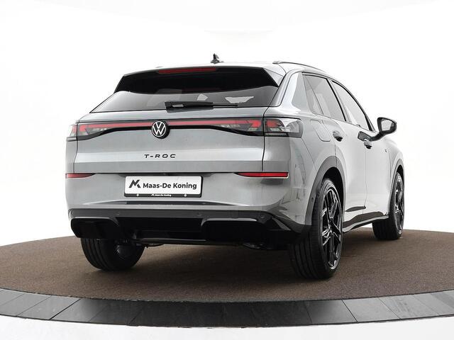 Volkswagen T-Roc R-Line First Edition 1.5 eTSI 150 PK 7 versn. DSG · Achteruitrijcamera · Draadloze telefoonlader · High-end geluidsysteem Harman Kardon · Koplampverlichting matrix-led (IQ.LIGHT) ·