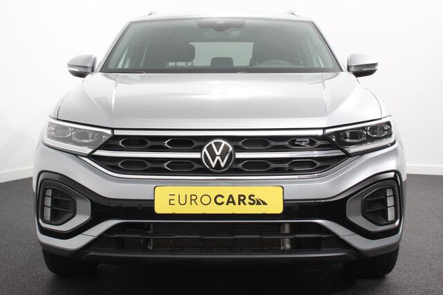 Volkswagen T-Roc 1.5 TSI 150pk DSG R-Line | Navigatie | Apple Carplay/Android Auto | Parkeersensoren | Camera | Blind Spot Assist | Adaptive Cruise Control | Elektrische achterklep | Stoel- en stuurverwarming | Climate Control | Ledverlichting | Virtual Cockpit