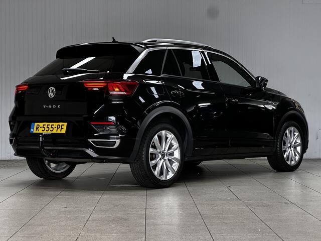 Volkswagen T-Roc 1.5 TSI Sport Business R/ Automaat!/ Trekhaak/ Zwarte hemel/ Virtual Cockpit/ LED Koplampen/ 18''LMV/ Stoelverw./ Grootlichtass./ Flippers/ Apple+Android/ DAB+/ Clima/ Navi/ Cruise/ Bluetooth/ Multi.Stuur/ PDC V+A.