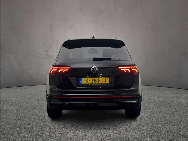 Volkswagen TIGUAN 1.5 TSI R-Line Business+ 150pk DSG, Lederen bekleding, Panoramadak, Black style, Trekhaak, Stoelverwarming, Stuurverwarming, Elektrische achterklep, Adaptieve cruise control, Dynamic chassis control, Navigatie, App connect