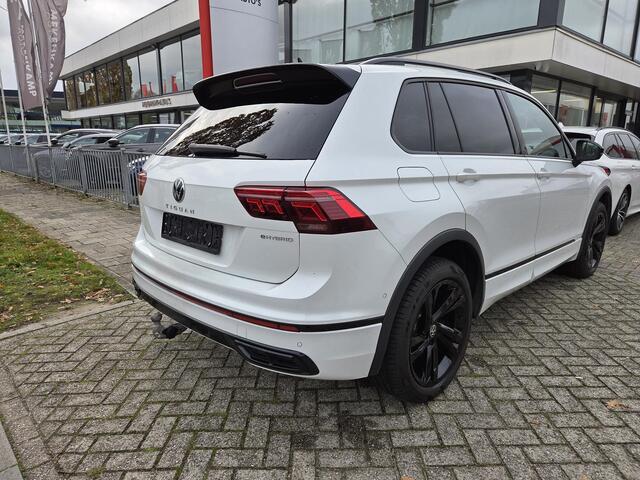 Volkswagen TIGUAN 1.4 TSI eHybrid R-Line Business Black Style 19"/Panoramadak/Trekhaak/Leder + memory/Head-up/Elektrische klep/Dodehoek/Stuur + stoelverwarming/IQ Lights/Adaptieve cruise