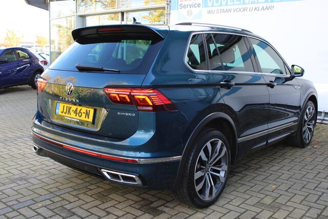 Volkswagen TIGUAN 1.4 TSI eHybrid R-Line Business+ | Incl. 12 maanden Garantie | Panorama dak | Memory stand stoelen | Trekhaak wegklapbaar | Stoel & Stuurverwarming | 360* Camera | Climate controle | Adaptive cruise | Elektrische kofferbakklep | Dodehoek detectie | IQ. Li