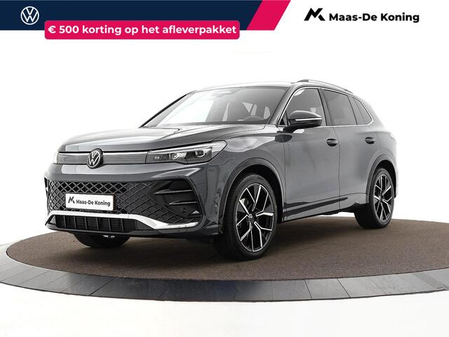 Volkswagen TIGUAN 1.5 eTSI 150pk DSG R-Line Business · Apple/Android Car Play · Camera · Elek. Trekhaak · Massage · Navigatie · 20'' Inch · Garantie t/m 27-02-2028 of 100.000km