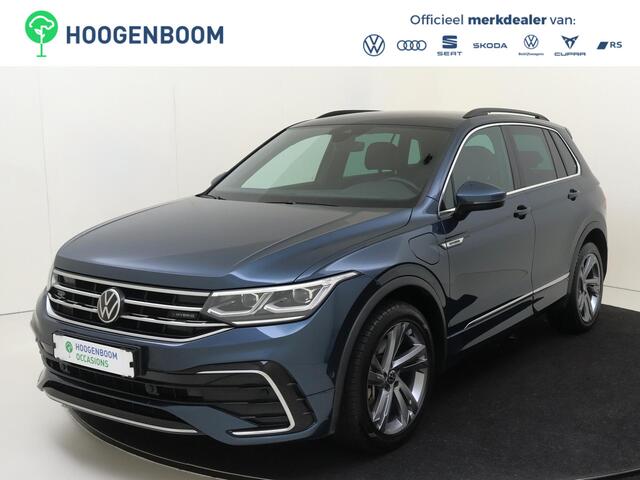 Volkswagen TIGUAN 1.4 TSI eHybrid R-Line Business | SoH 90% | Trekhaak | Achteruitrijcamera | Parkeerassistent | 3-zone airco | Dodehoek detectie | Keyless | Adaptieve cruise control | CarPlay |