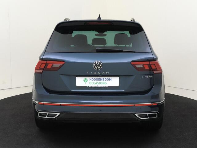 Volkswagen TIGUAN 1.4 TSI eHybrid R-Line Business | SoH 90% | Trekhaak | Achteruitrijcamera | Parkeerassistent | 3-zone airco | Dodehoek detectie | Keyless | Adaptieve cruise control | CarPlay |
