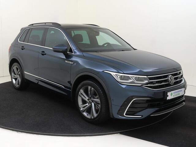 Volkswagen TIGUAN 1.4 TSI eHybrid R-Line Business | SoH 90% | Trekhaak | Achteruitrijcamera | Parkeerassistent | 3-zone airco | Dodehoek detectie | Keyless | Adaptieve cruise control | CarPlay |