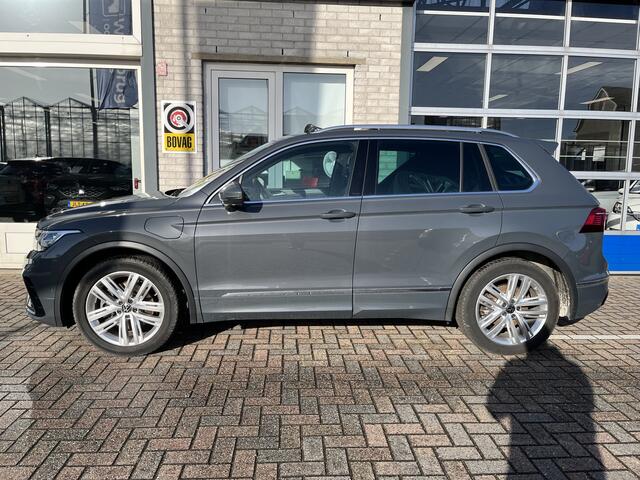 Volkswagen TIGUAN 1.4 TSI eHybrid R-Line / AUTOMAAT/ LEER/ PANO/ DCC/ APP-CONNECT/ PARK.SENSOR+360 CAMERA/ MEMORY SEAT/ STUUR+STOELVERWARM./ DODEHOEK/ HEAD-UP/ KEYLESS/ ELEK.KLEP/ NAVI/ DAB/ CLIMA/ LED/ 20'' LMV