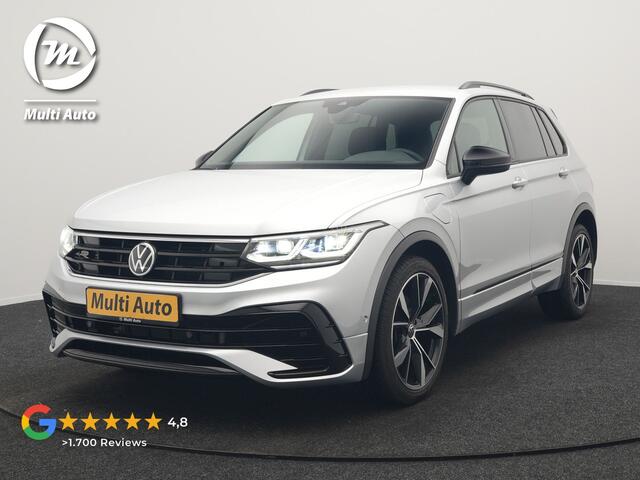 Volkswagen TIGUAN 1.4 TSI eHybrid R-Line PHEV 245pk Dealer O.H | Trekhaak Af Fabriek | Adaptive Cruise | IQ Light | Adaptive Onderstel | Camera | Alcantara Sportstoelen & Stuur Verwarmd | Blis | Keyless | Sfeerverlichting | Virtual | Navigatie | DAB | 20"L.M | Plug In Hybr