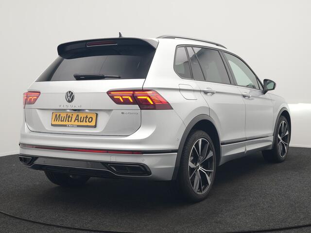 Volkswagen TIGUAN 1.4 TSI eHybrid R-Line PHEV 245pk Dealer O.H | Trekhaak Af Fabriek | Adaptive Cruise | IQ Light | Adaptive Onderstel | Camera | Alcantara Sportstoelen & Stuur Verwarmd | Blis | Keyless | Sfeerverlichting | Virtual | Navigatie | DAB | 20"L.M | Plug In Hybr