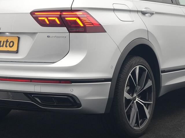 Volkswagen TIGUAN 1.4 TSI eHybrid R-Line PHEV 245pk Dealer O.H | Trekhaak Af Fabriek | Adaptive Cruise | IQ Light | Adaptive Onderstel | Camera | Alcantara Sportstoelen & Stuur Verwarmd | Blis | Keyless | Sfeerverlichting | Virtual | Navigatie | DAB | 20"L.M | Plug In Hybr