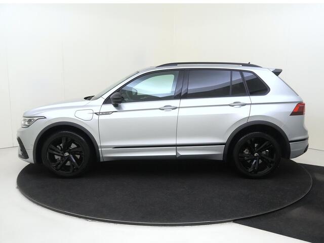 Volkswagen TIGUAN 1.4 TSI eHybrid R-Line Business | SoH 96% | Panoramadak | Lederen bekleding | Trekhaak | Head-up display | 360 camera | Black style | Adaptieve demping | Stoelverwarming voor en achter |