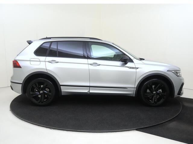 Volkswagen TIGUAN 1.4 TSI eHybrid R-Line Business | SoH 96% | Panoramadak | Lederen bekleding | Trekhaak | Head-up display | 360 camera | Black style | Adaptieve demping | Stoelverwarming voor en achter |