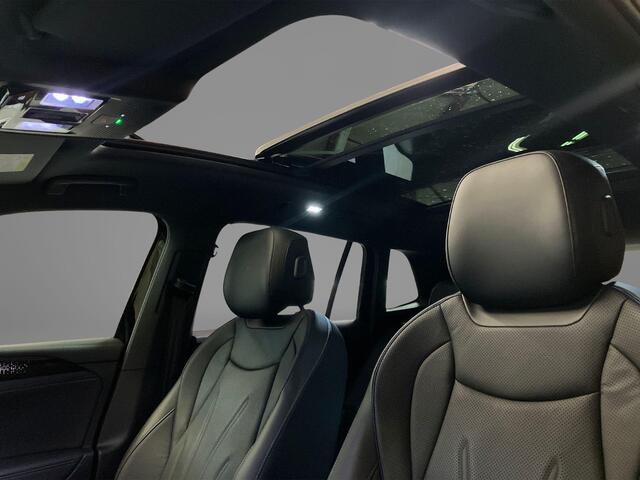 Volkswagen TIGUAN 1.5eHybrid 200kW/272PK R-Line Black Style · Panoramadak · Leder · Trekhaak · 360°Camera + Parkeersensoren · Garantie t/m 22-06-2030 of 100000km.